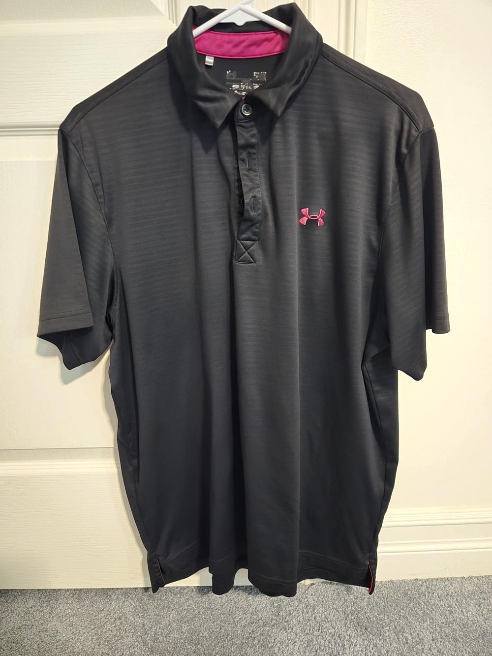 Under Armour Men’s Black Polo Shirt with Pink Logo